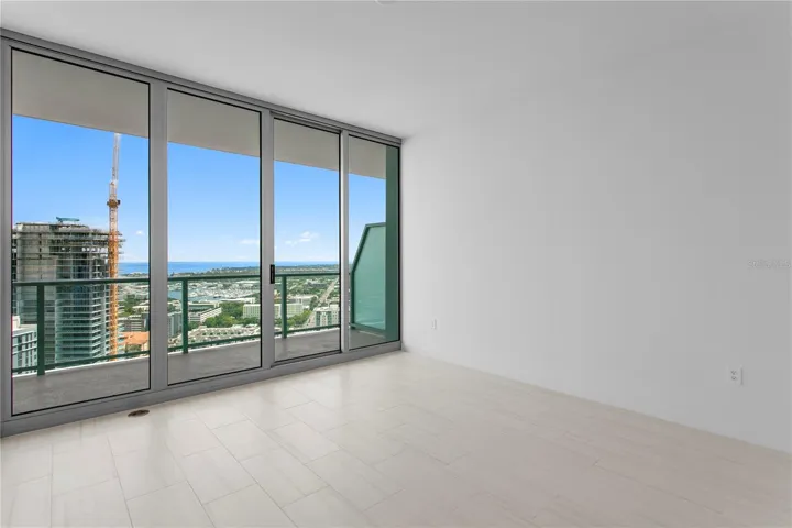 Primary Bedroom with balcony Access.