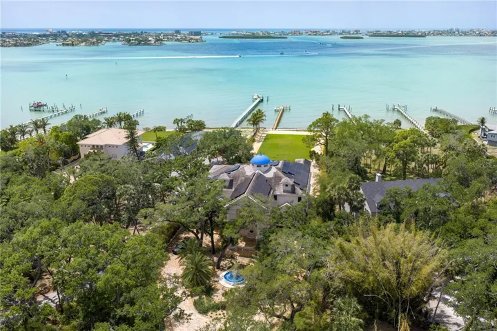 Private, gated setting surrounded by lush tropical landscaping.