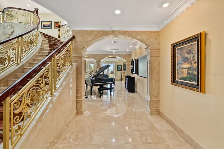 Gallery-style corridor ideal for art display, a grand piano, or entertaining.
