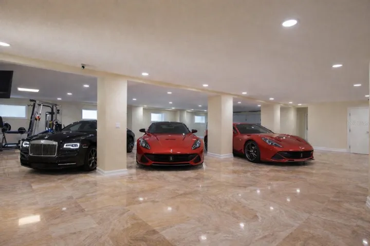 Room for 4 cars on the right garage or more including motorcycles, golf carts, or small baot.