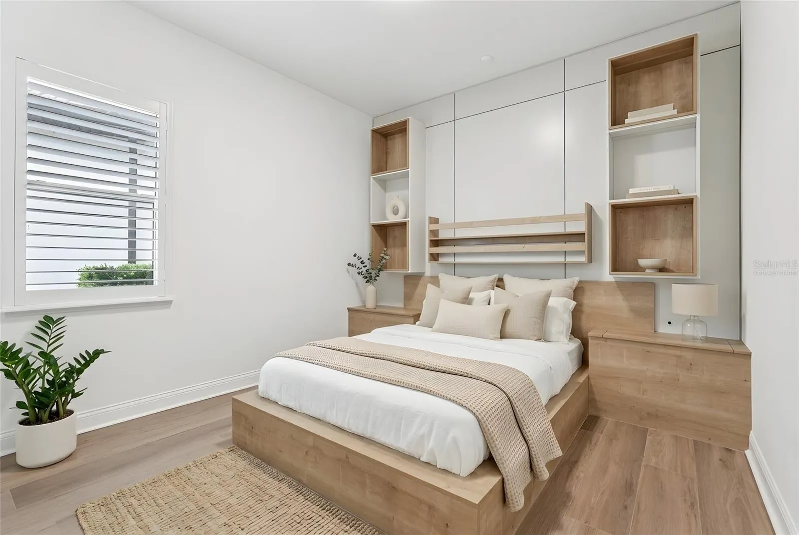 Second bedroom features its own custom built-in. Virtually Staged.