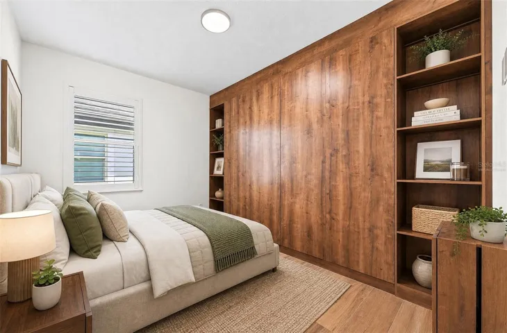 3rd Bedroom with custom cabinet and storage Virtually staged.