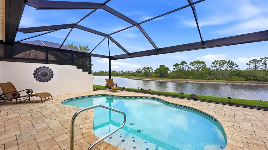 Pool with pond view.