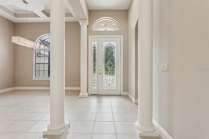 Foyer leading to Living room and Dining area, bright and light
