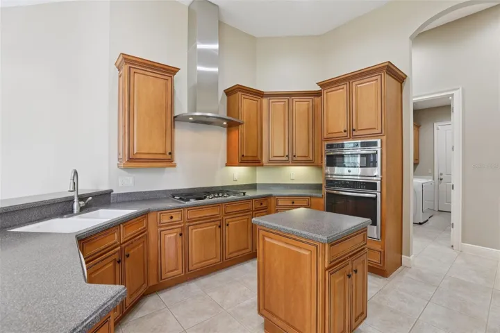 Kitchen with GE appliances and  gas stove top