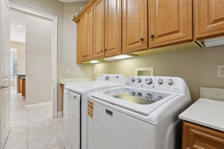Washer and gas dryer