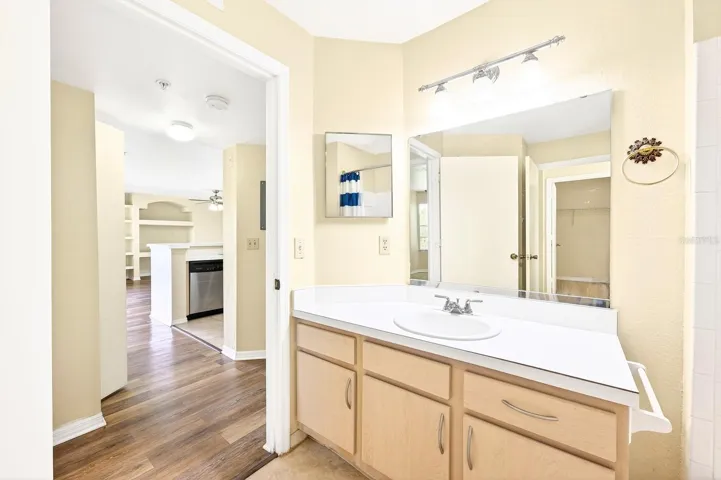 The spacious Bath is easily accessible from both Bedrooms.