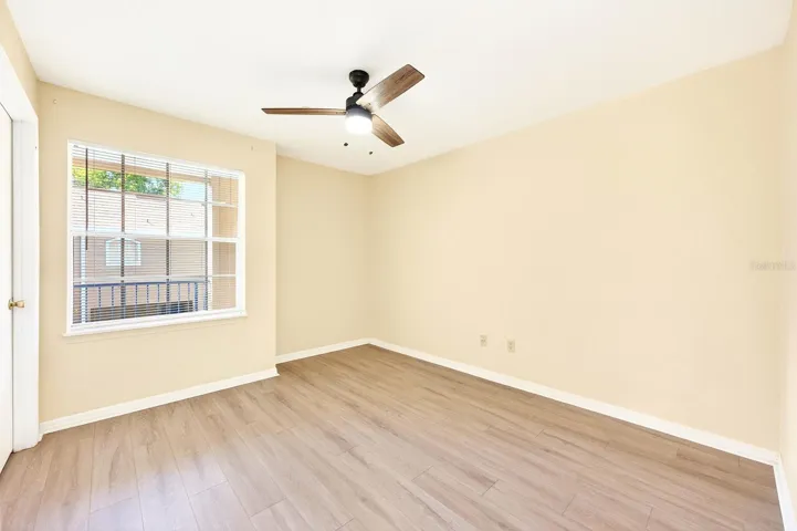 The second bedroom is also GENEROUSLY SIZED, with its own walk-in closet and easy access to the bathroom—ideal for guests, a home office, or additional living space.