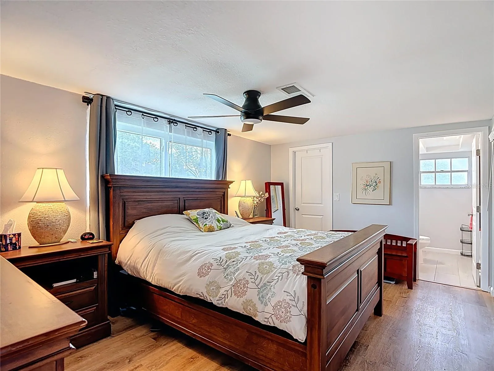 Primary bedroom with on suite bathroom. Windows in all bedrooms replaced, less than 2 years old.