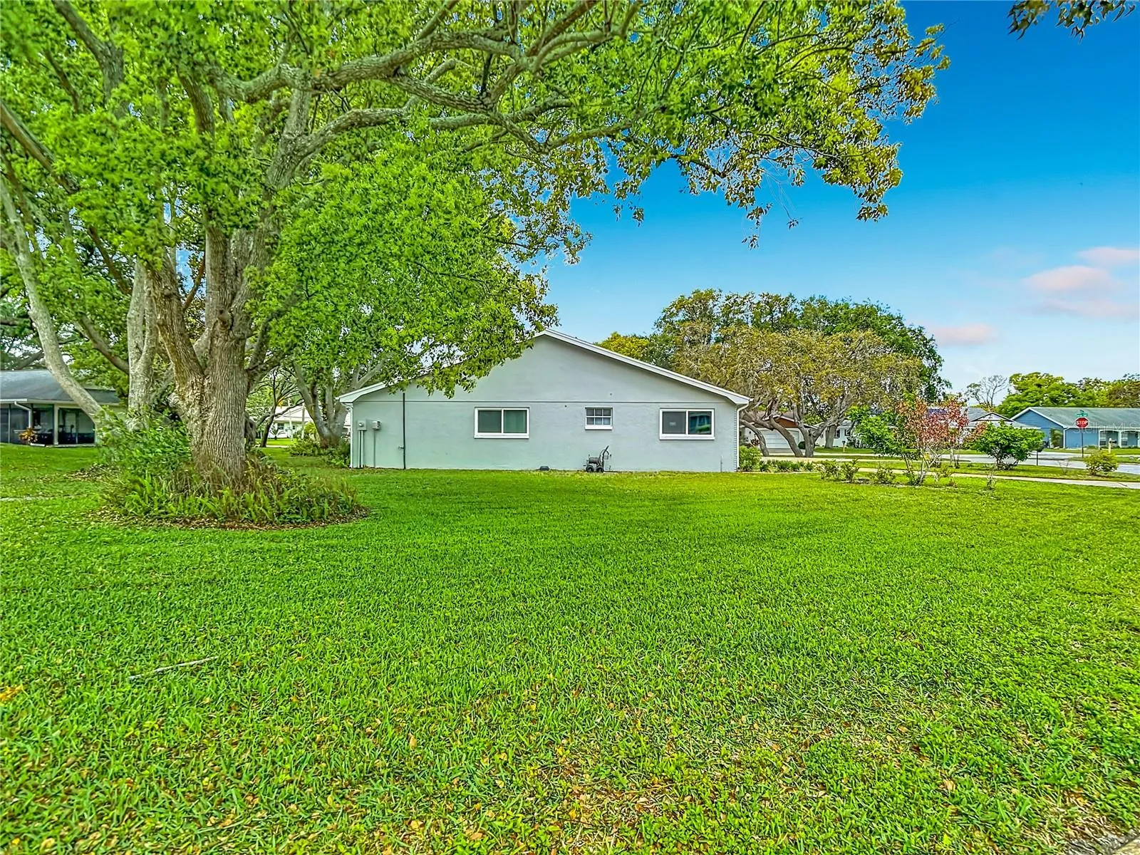 Side yard view.  Large corner lot with great privacy.