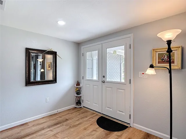 Foyer with a new hurricane rated entry door replaced in 2024-2025.