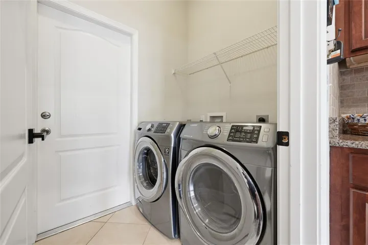 Laundry area with shelf