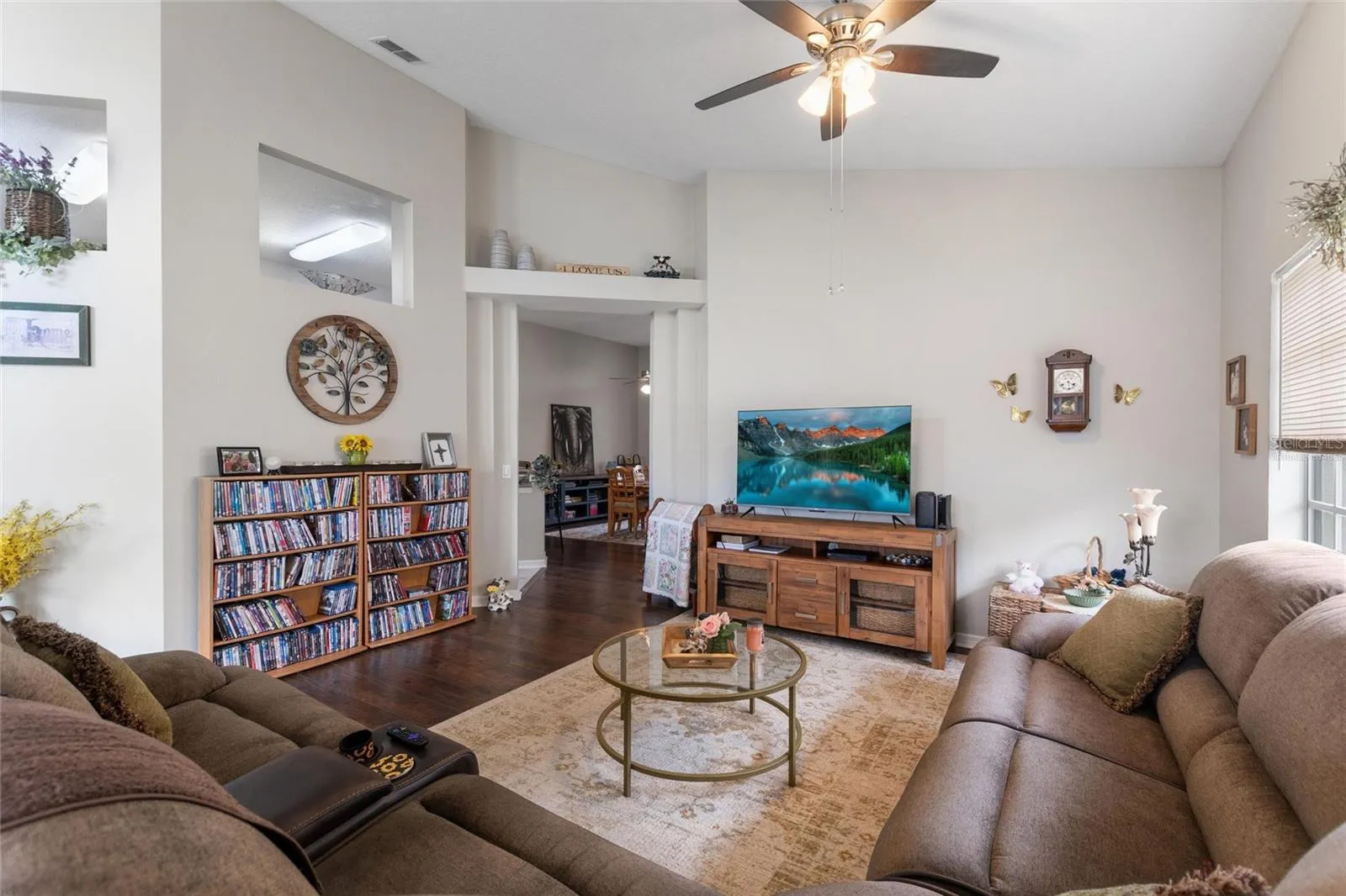 Great room with virtually staged TV screen
