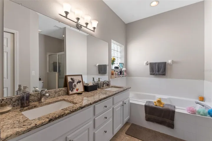 Primary bathroom with walk-in & linen closets