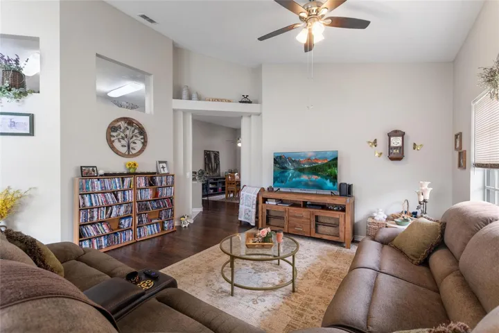 Great room with virtually staged TV screen