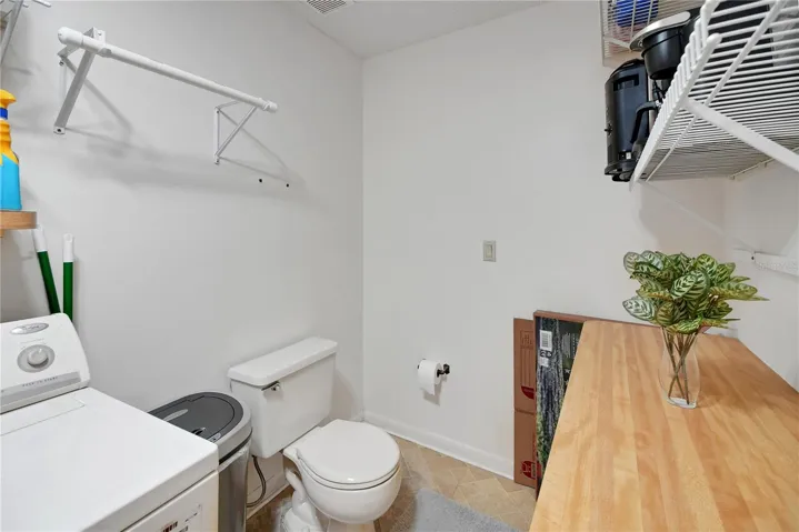 1/2 BATH IN LAUNDRY ROOM