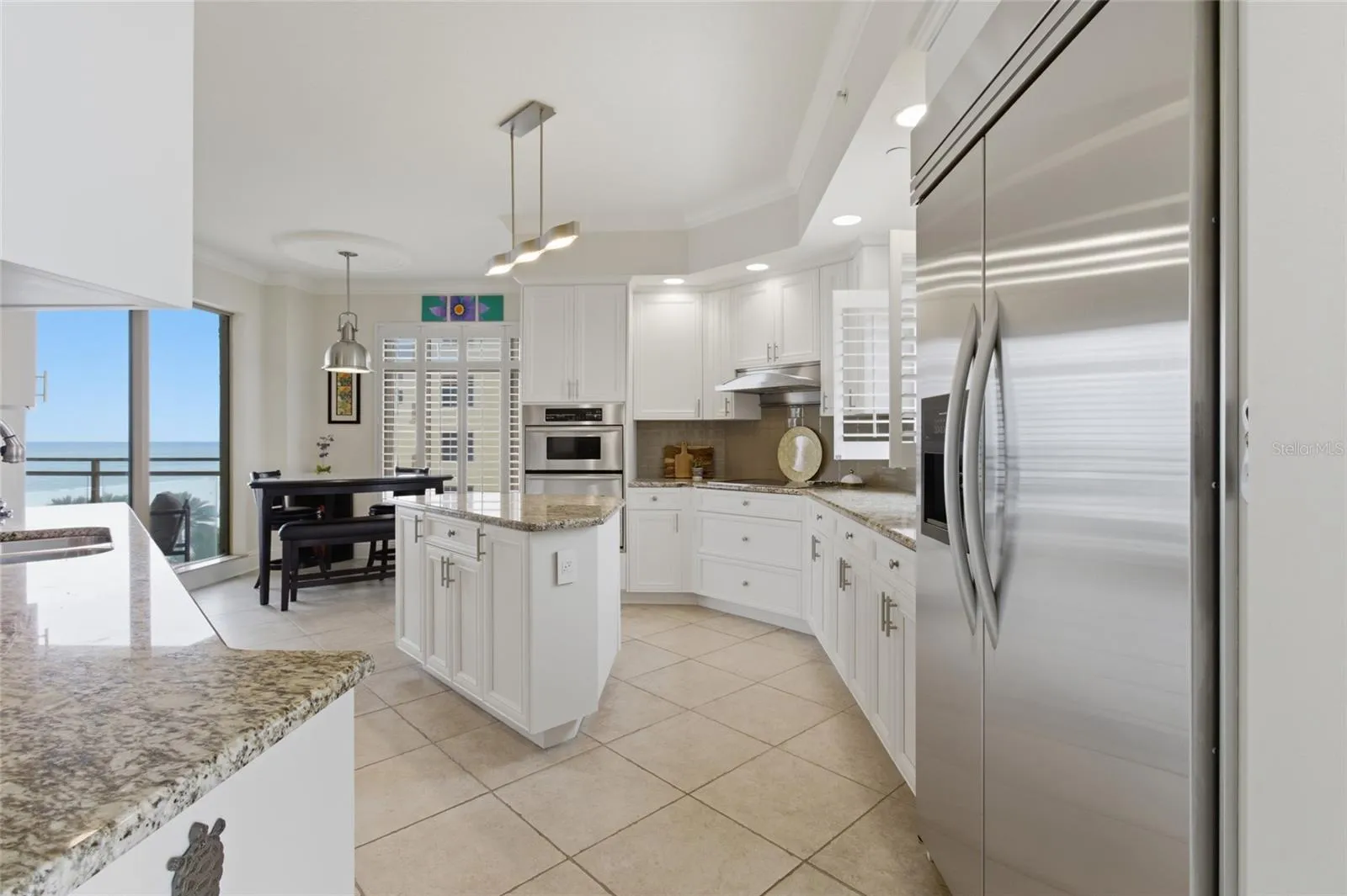 Spacious dining room overlooking the intercoastal.