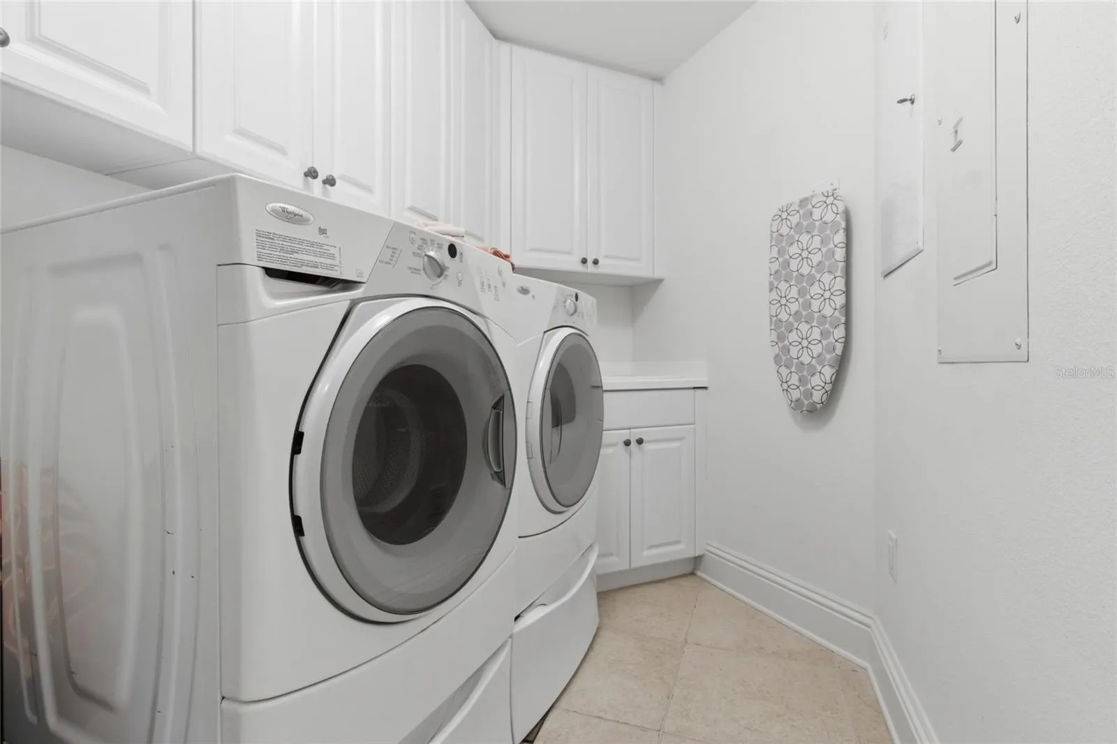 Large laundry room inside the unit with washer and dryer included.