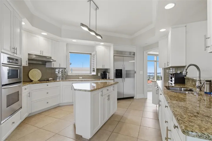 Walking from dining room to kitchen. Views on both the right and left!