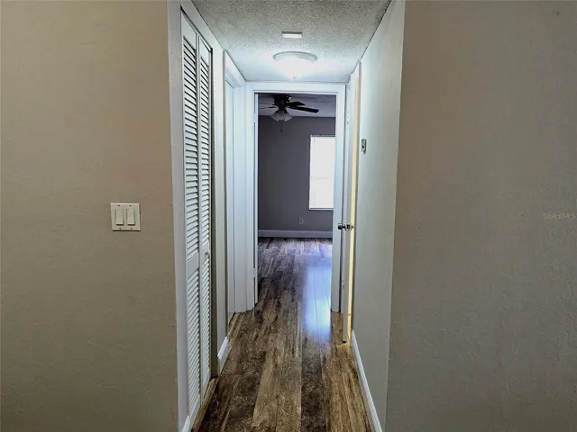 Hallway to Guest Bathroom and Bedroom 1