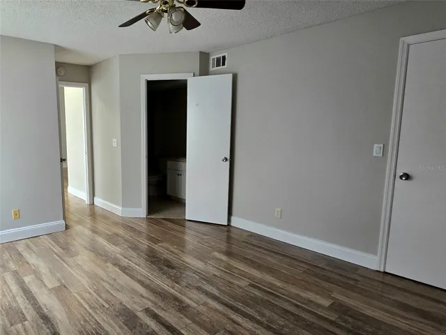 Bedroom 2 with Closet Door and Ensuite Bathroom