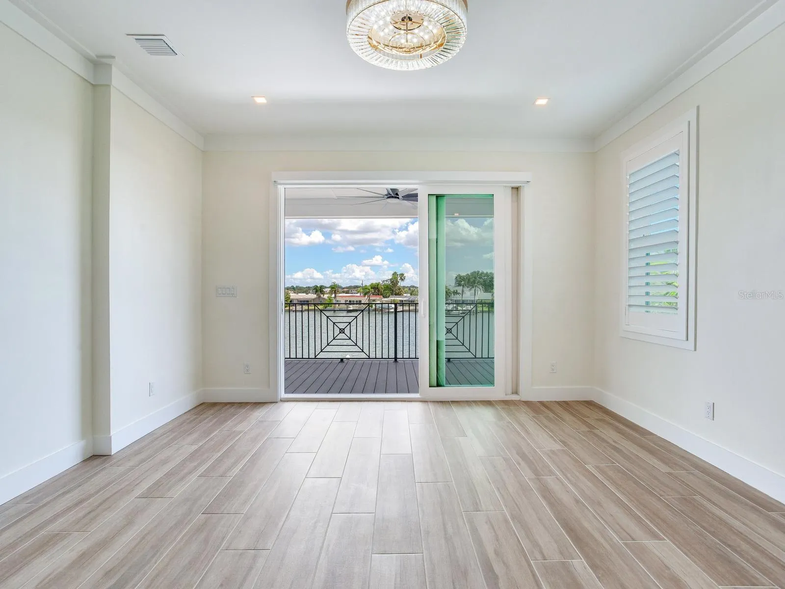 Picture a bedroom of an already built SeaSafe home for reference purposes only.