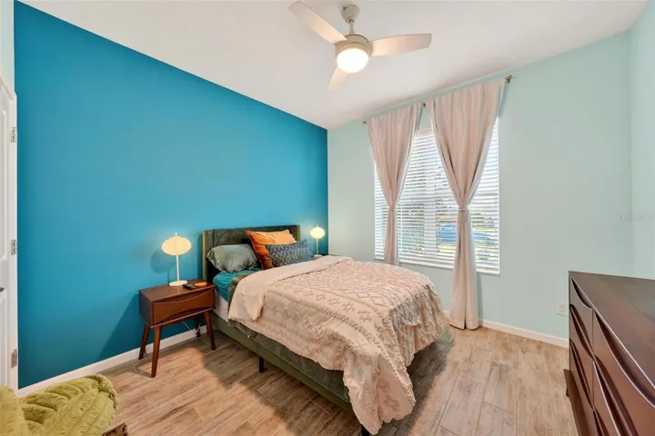 From inside this bedroom is left of the front door