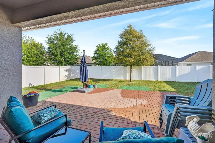Seller enlarged the brick pavers for outdoor seating and entertaining