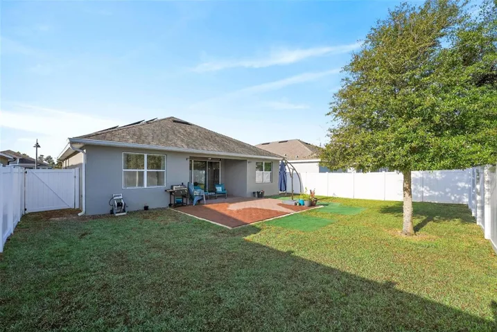 View of 5-foot gate to left allowing larger access to backyard
