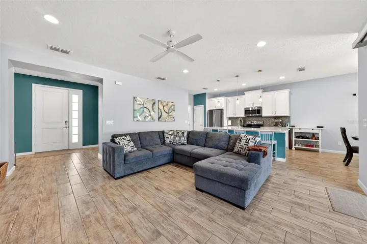 Family room showing front door and kitchen