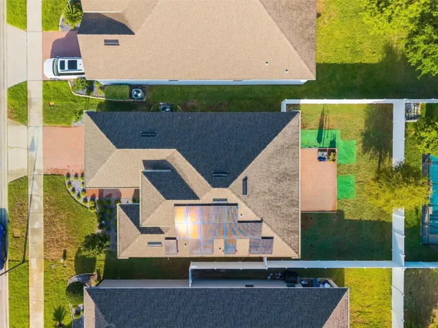 View of roof with solar and lot