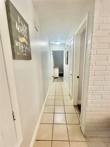 Hallway to bathrooms and bedrooms