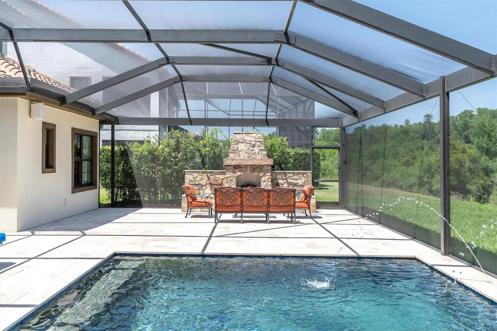CUSTOM STONE OUTDOOR FIREPLACE~ THE ULTIMATE FLORIDA OUTDOOR LIFESTYLE