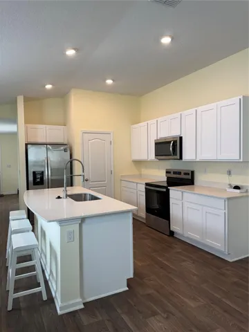 Kitchen with stainless appliances.