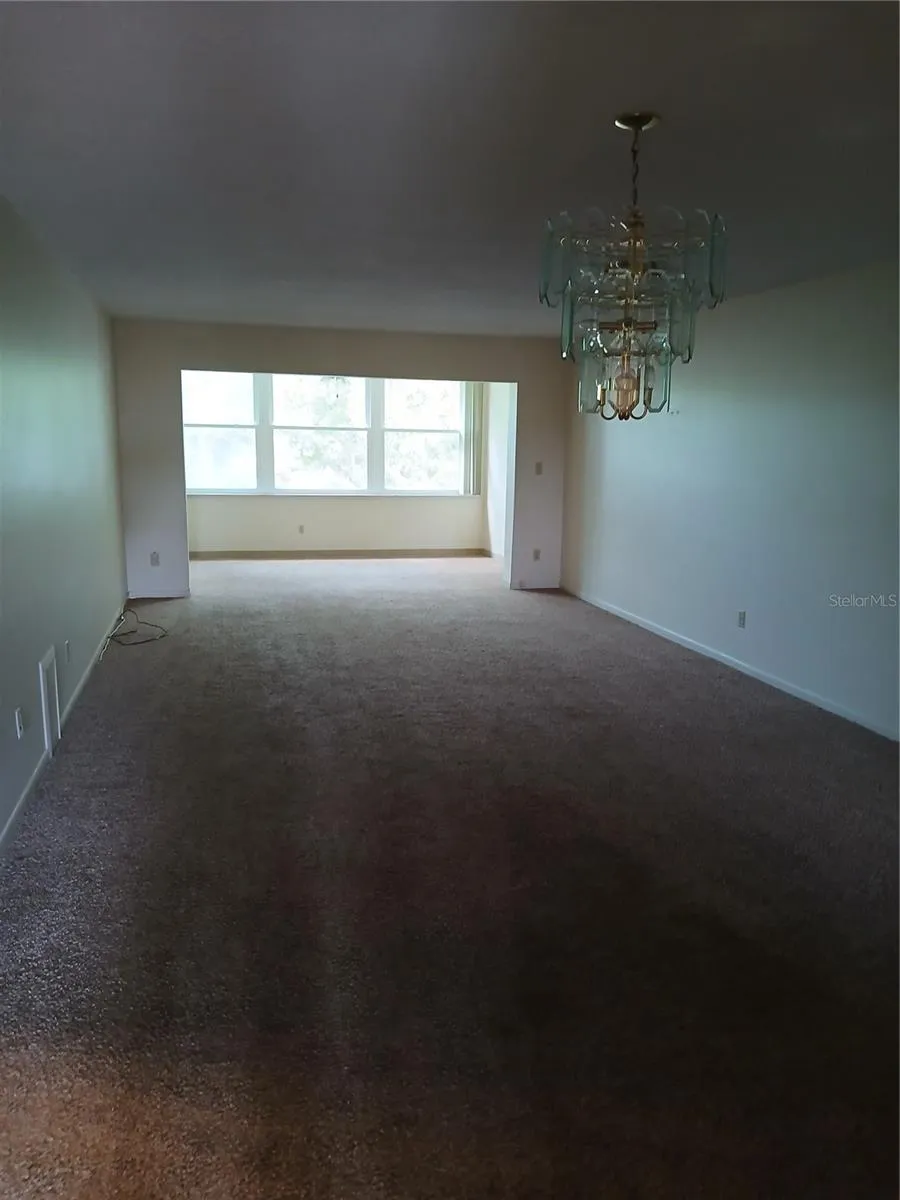 The living room is 20 ft long bonus room adds 10 ft.