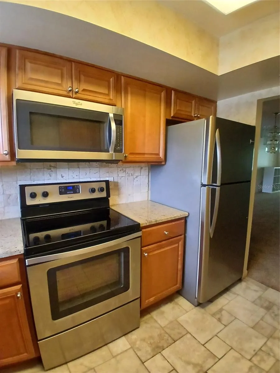 Stove, Microwave, Refrigerator.