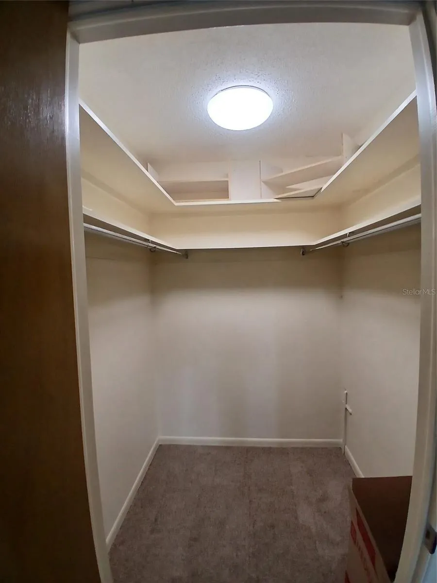 Walk in closet located in the bedroom.