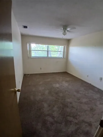 The light and bright bedroom with a lovely sky view offering with plenty of room for your furnishings.