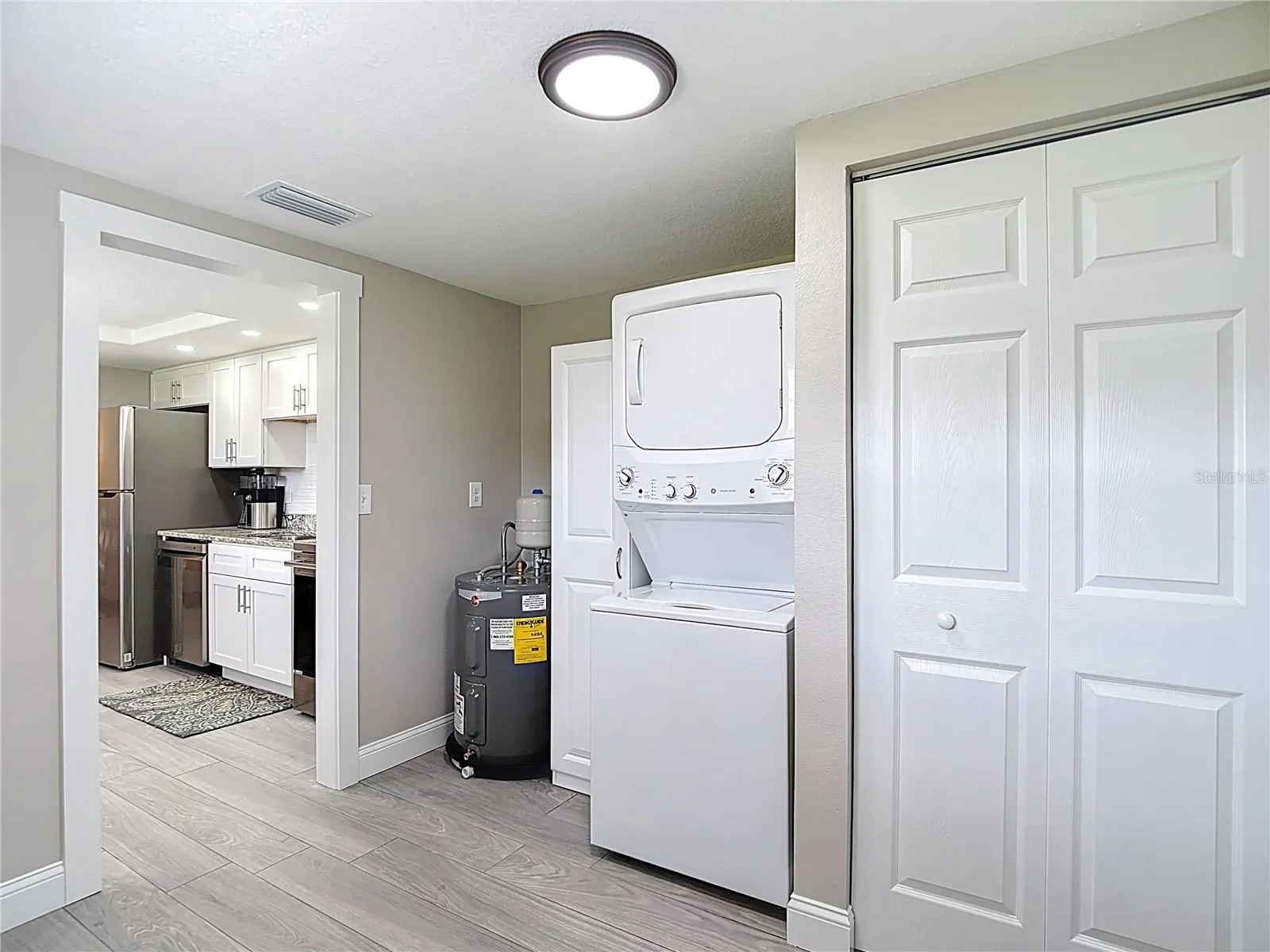 Washer and dryer located in utility room.