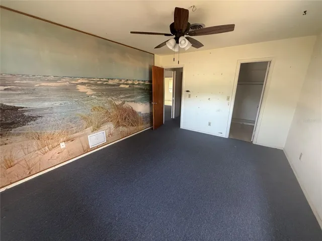 Primary Bedroom with walk-in closet