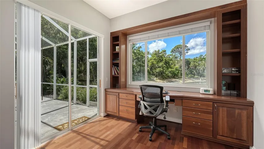 OFFICE WITH WINDOW OFF PRIMAR BEDROOM.