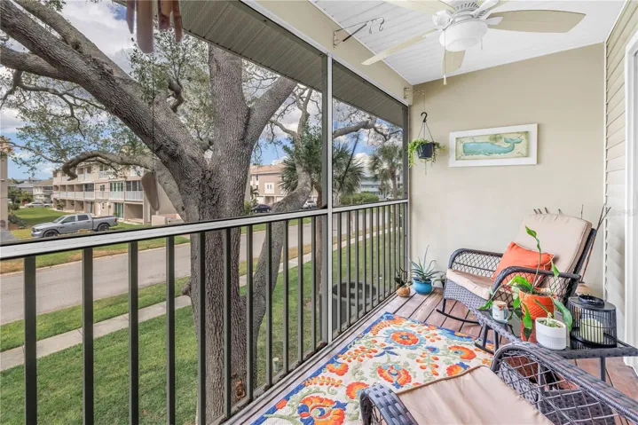 Enclosed screened  balcony on second floor off of Living room