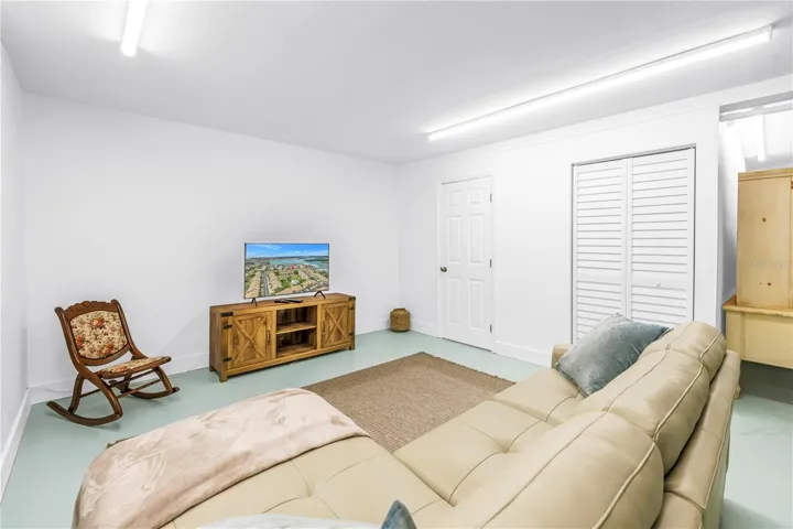 Bonus room in garage with bathroom and large storage closet