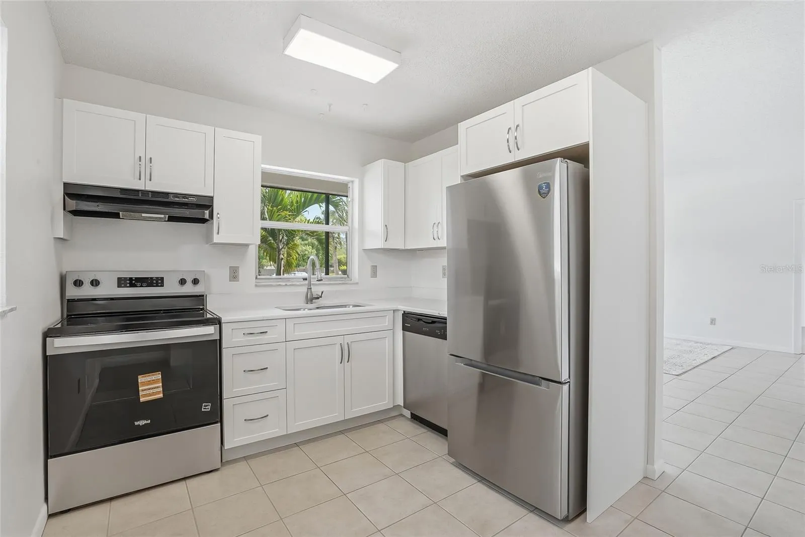 Kitchen area opens to the living and dining area