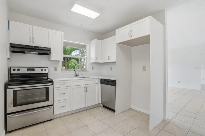 Kitchen area opens to the living and dining area