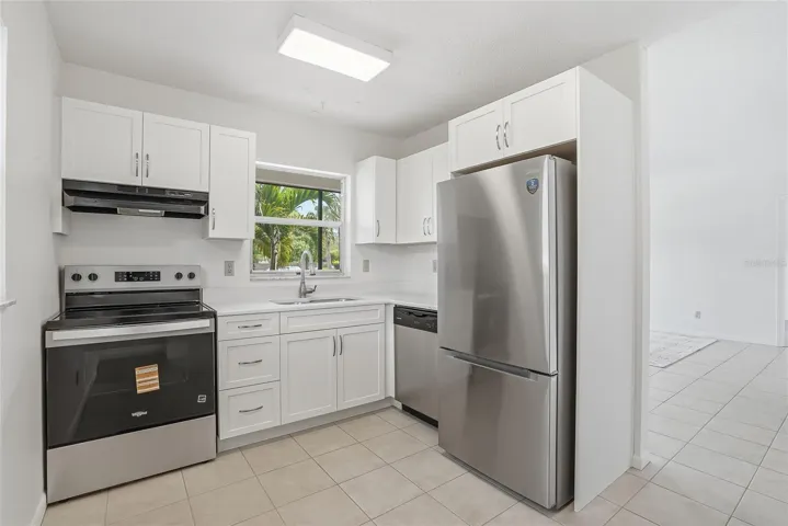 Kitchen area opens to the living and dining area