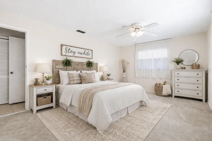 Virtually staged guest bedroom.