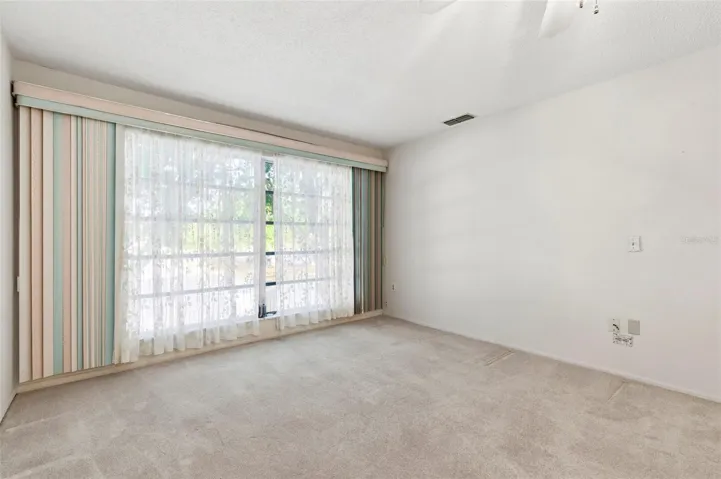 Big bay window at the end of the living room.