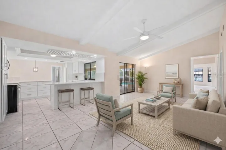Virtually Staged Family room overlooking the kitchen and lanai