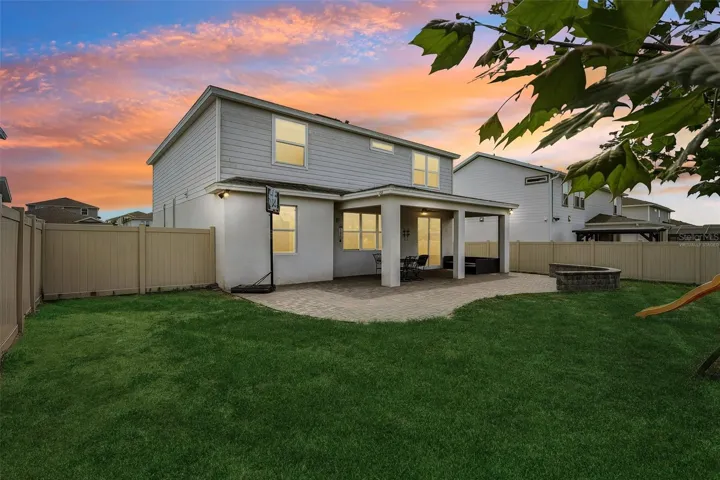 Virtually Staged Back Yard-grass & twilight